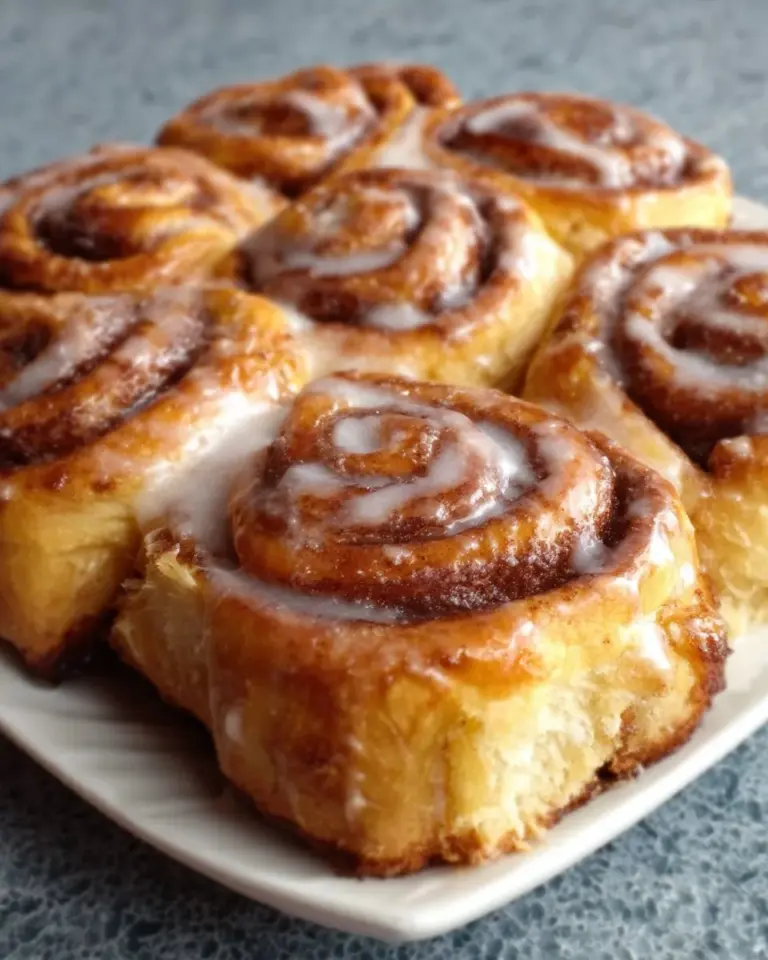 Delicious Absolutely Sinful Cinnamon Rolls topped with icing