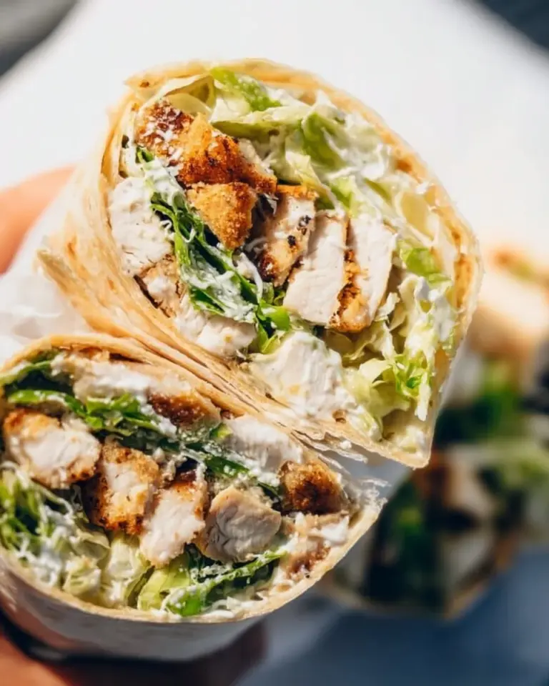 Chicken Caesar Wrap with lettuce, grilled chicken, and Caesar dressing