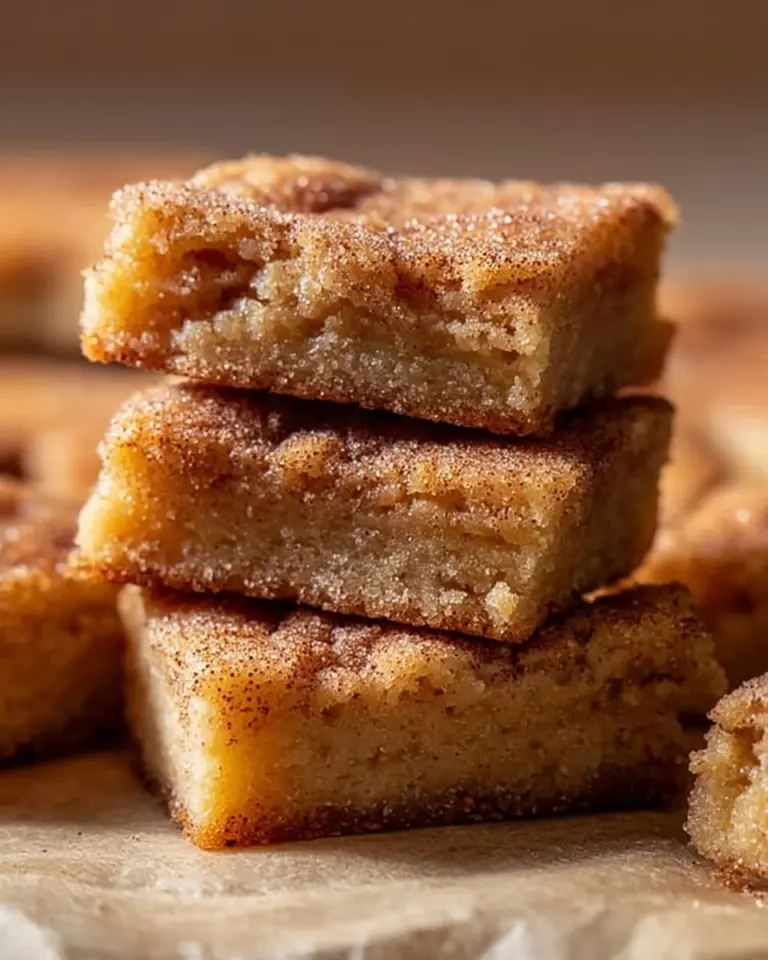 Delicious cinnamon sugar blondies topped with cinnamon and sugar.