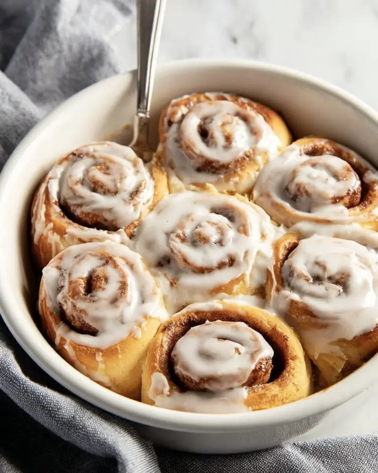 Delicious homemade easy cinnamon rolls with icing on a plate