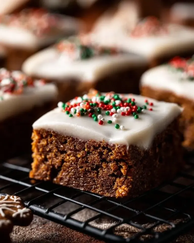 Homemade gingerbread cookie bars with festive spices and icing