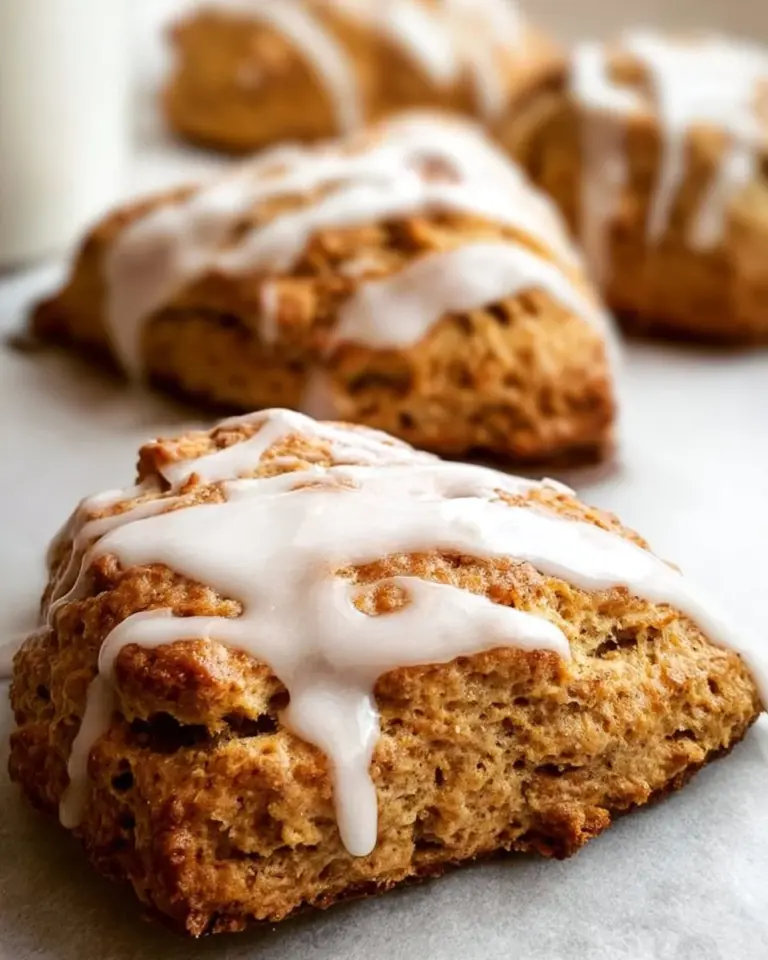 Deliciously spiced Gingerbread Scones arranged on a festive plate.