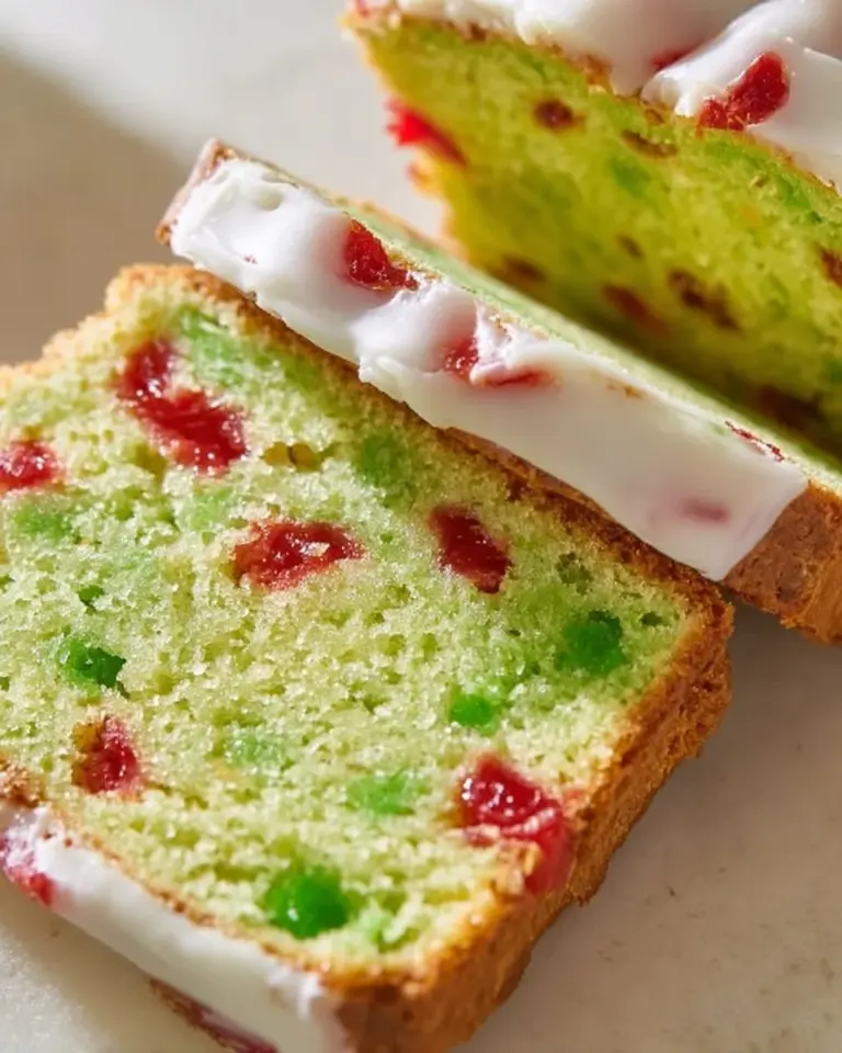 Freshly baked pistachio cherry bread with nuts and cherries.