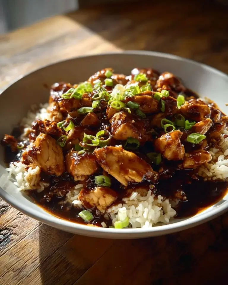 Crockpot chicken cooked with brown sugar for a sweet and savory flavor.