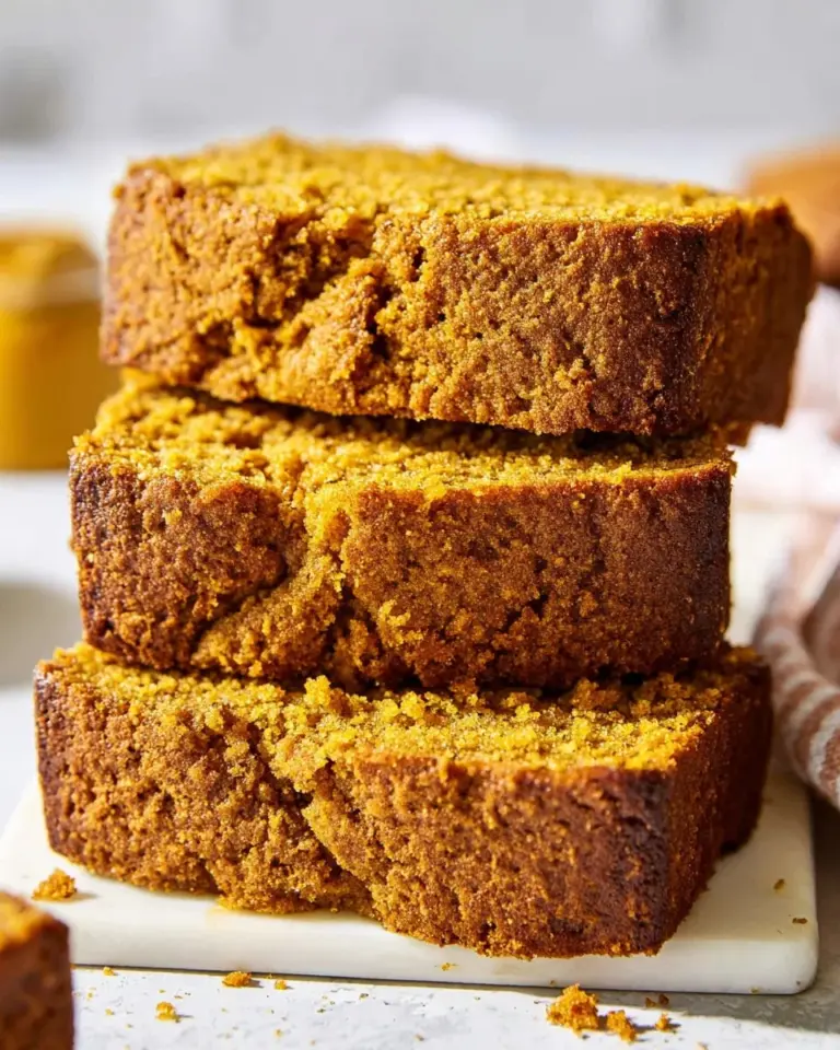 Gluten-free pumpkin loaf fresh out of the oven, ready to be enjoyed.