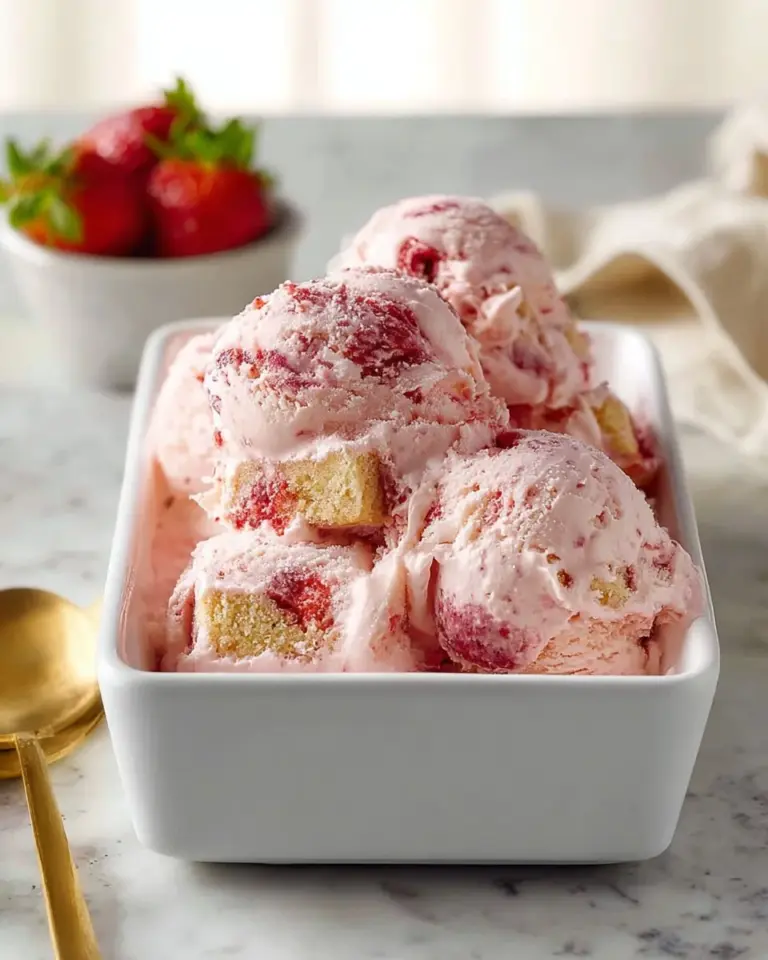 Delicious strawberry shortcake ice cream with fresh strawberries on top