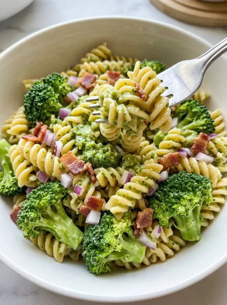 Delicious broccoli pasta salad with fresh vegetables and dressing